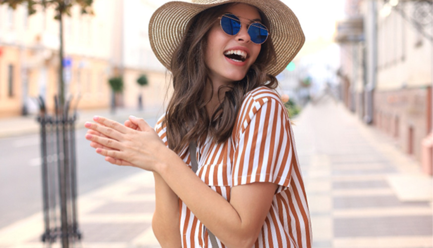 Woman showing off new smile with cosmetic bonding in San Antonio 