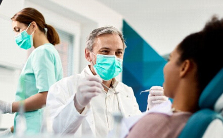 dentists treats patient
