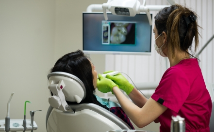 Dental team member capturing digital x-rays